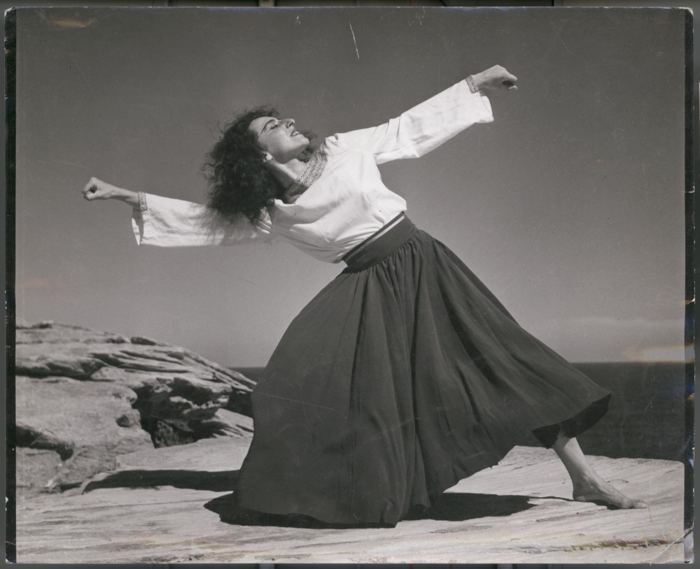 A woman performing the hora at the Israeli seaside in 1951.State Library of Victoria, Australia.
