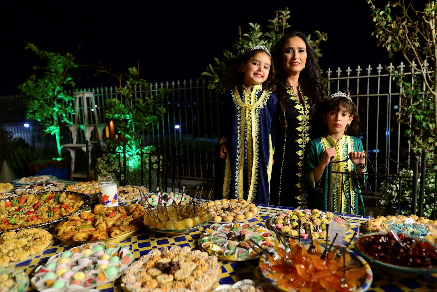 An Israeli woman and her children at the post-Passover festival of Mimouna, a North African Jewish tradition that is now a de-facto national celebration. Flash90.
