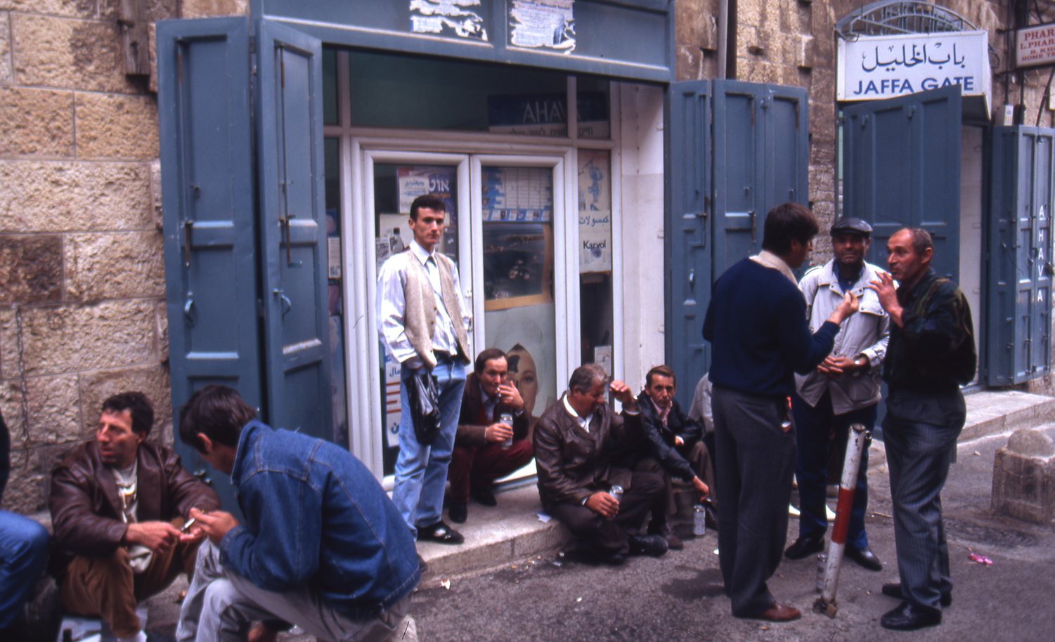 Customers smoke and talk in front of a shop in Jerusalem in 1970. Angelo Cozzi/Archivio Angelo Cozzi/Mondadori Portfolio via Getty Images.
