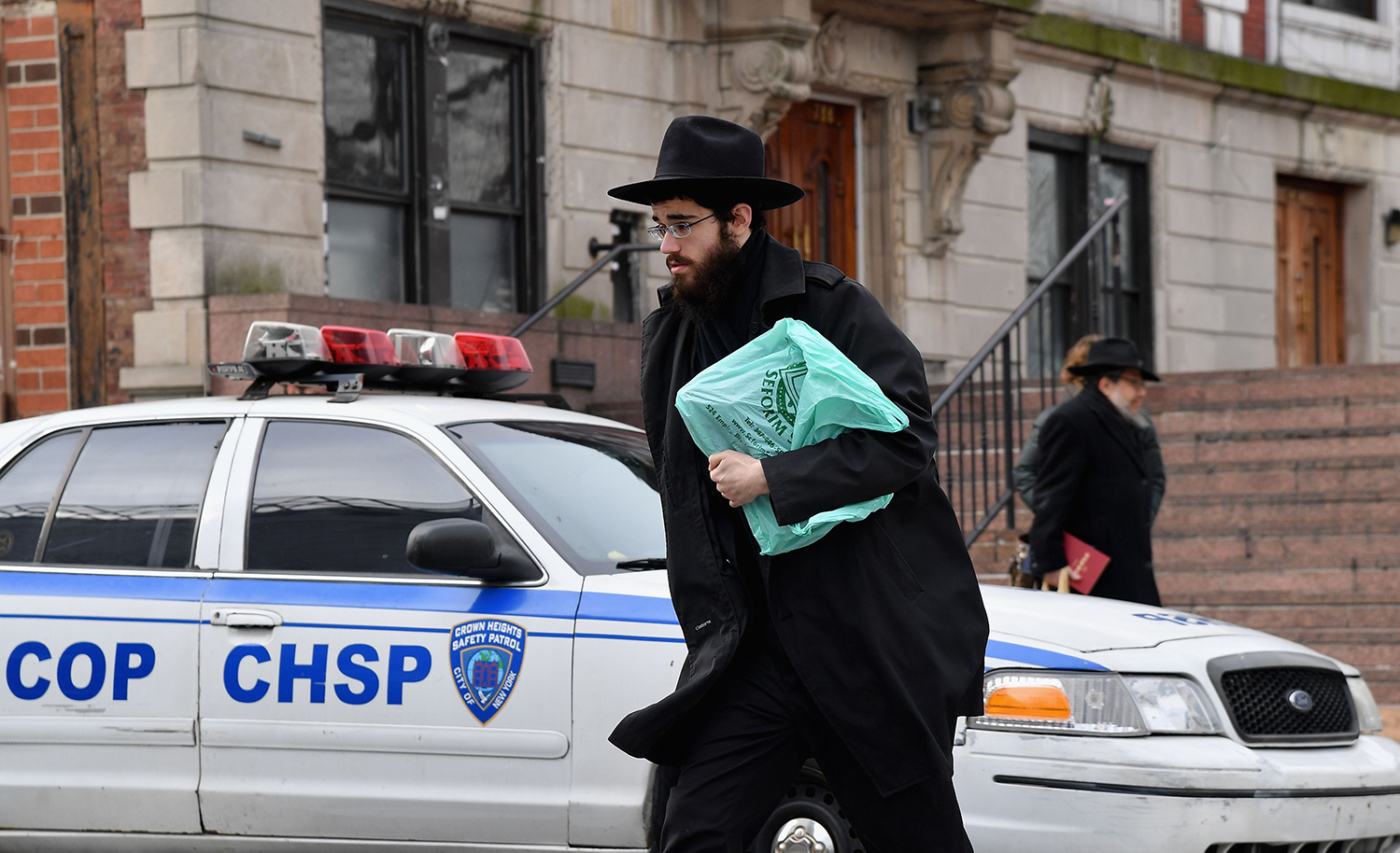 An Orthodox Jew in the Brooklyn neighborhood of Crown Heights on February 27, 2019. ANGELA WEISS/AFP via Getty Images.
