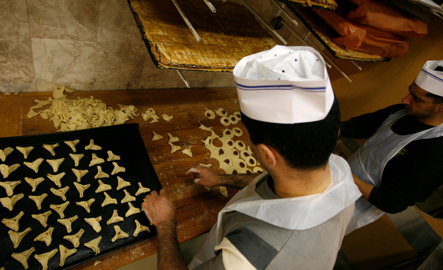 



Bakers in Jerusalem make hamantaschen for Purim in 2009. Miriam Alster/Flash90.




