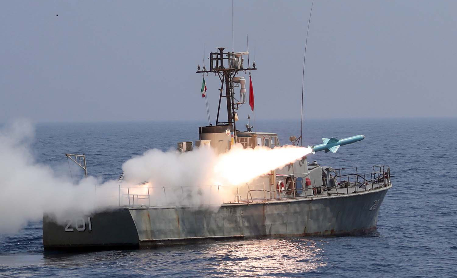 A missile being fired from an Iranian warship during the second day of a military exercise in the Gulf near the strategic strait of Hormuz in southern Iran. Iranian Army office/AFP via Getty Images.

