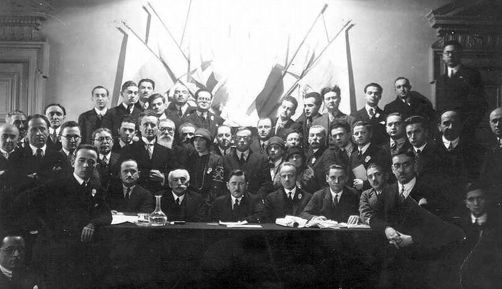 

Ze&#8217;ev Jabotinsky (second row in the very center, wearing glasses) at a Revisionist Zionist conference likely in Paris in the second half of the 1920s. Wikipedia.


