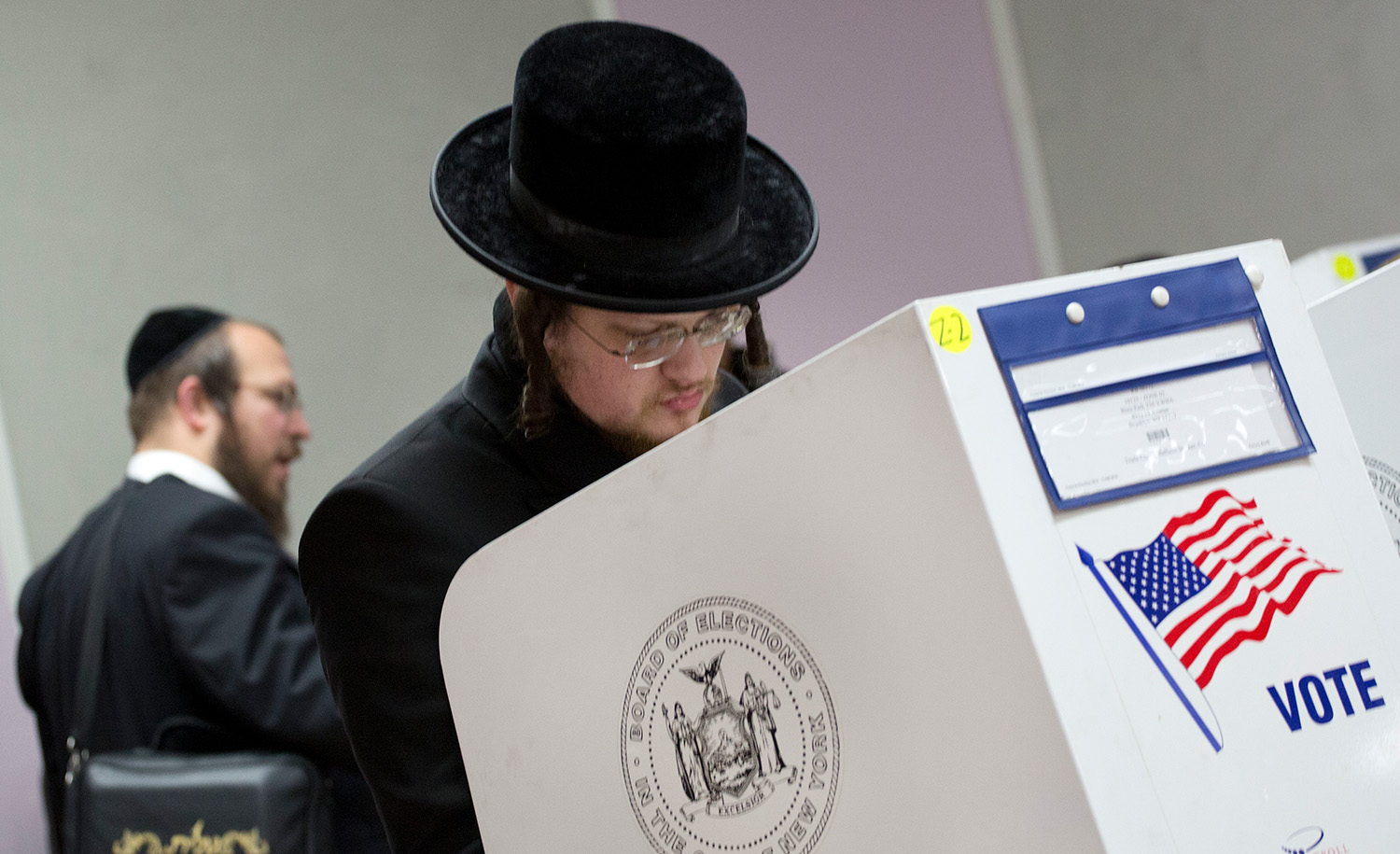 Jewish voters marking their ballots on November 8, 2016, in Brooklyn. AP Photo/Mark Lennihan.
