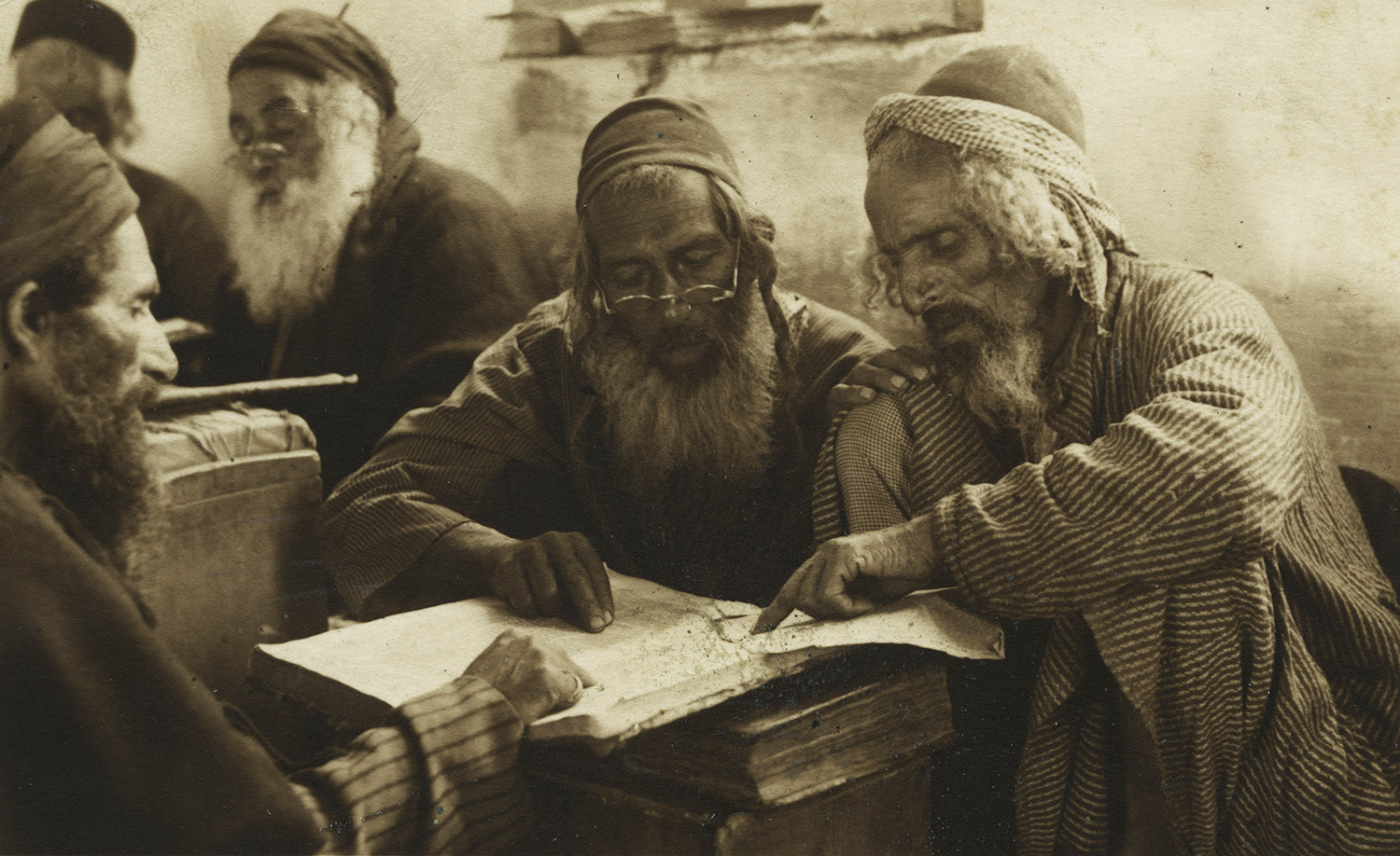 Yemenite Jews studying the Talmud in Jerusalem around 1920. History &amp; Art Images via Getty Images.
