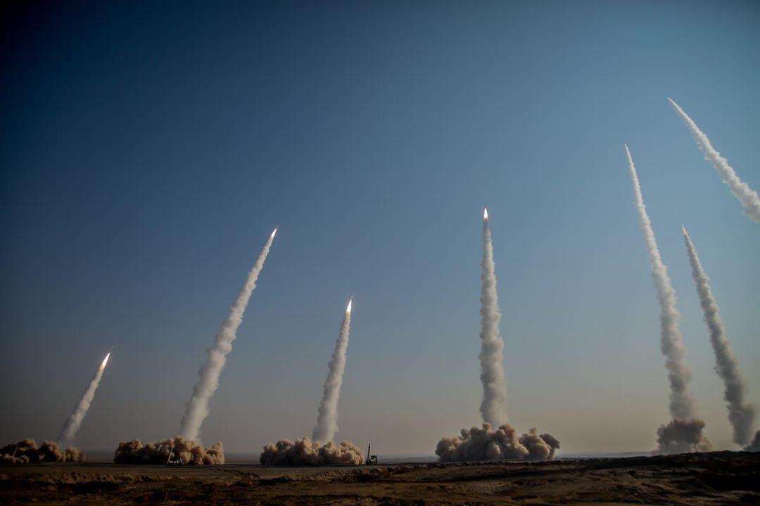 Members of the Islamic Revolutionary Guard Corps conduct a military drill with ballistic missiles and unmanned air vehicles in Dasht-e Kavir, Iran, on January 15, 2021. Photo by Sepahnews/Handout/Anadolu Agency via Getty Images.
