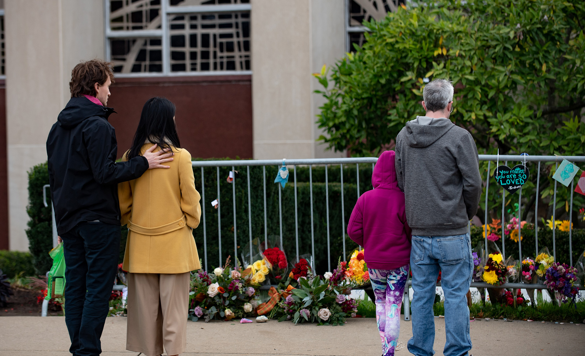 
Mourners along the fence at the Tree of Life Synagogue on the first anniversary of the attack on October 27, 2019 in Pittsburgh, Pennsylvania. Jeff Swensen/Getty Images.







