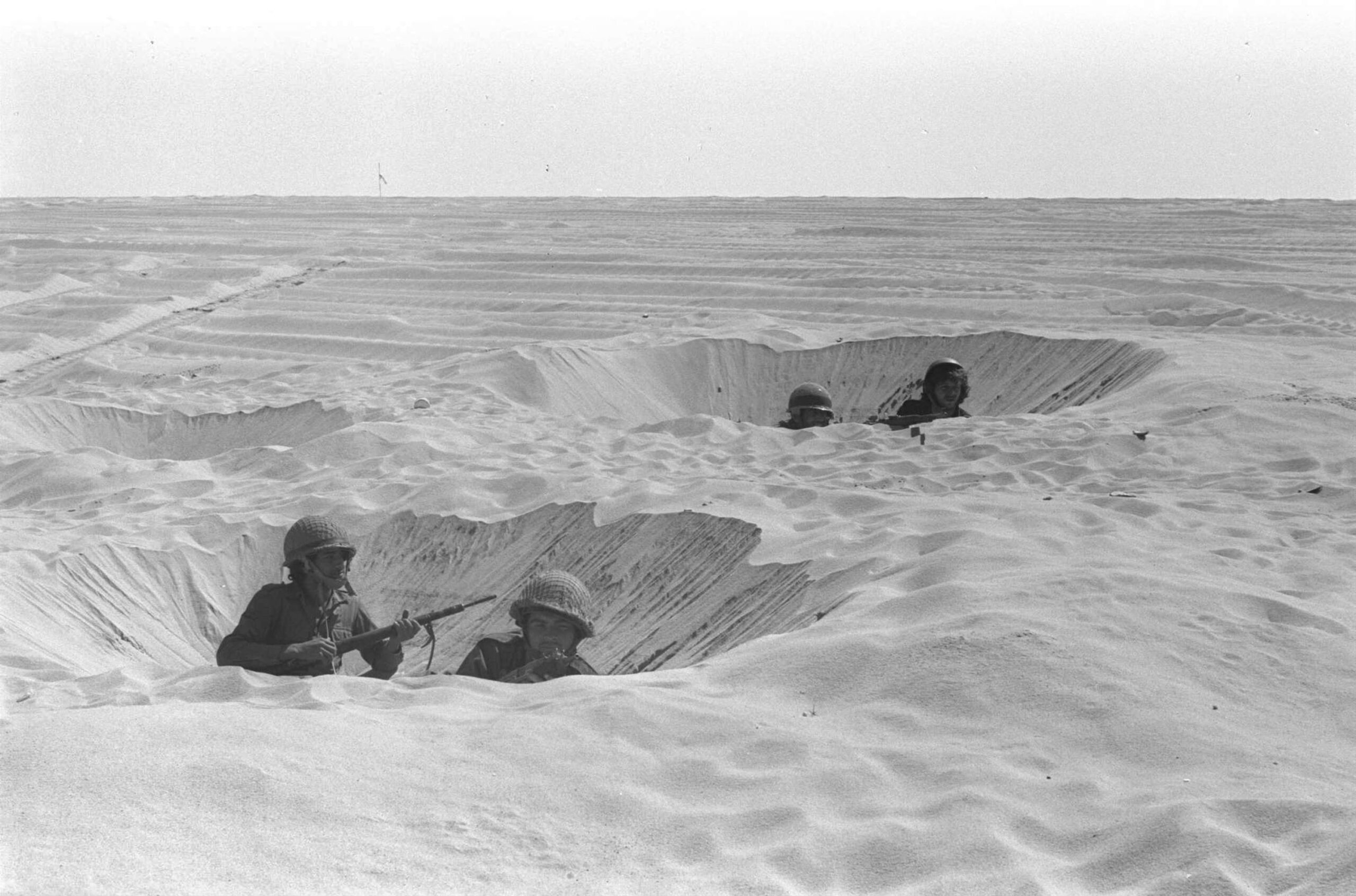 Israeli soldiers in foxholes on October 14, 1973 in the Sinai Desert during the Yom Kippur War. GPO/Getty Images.
