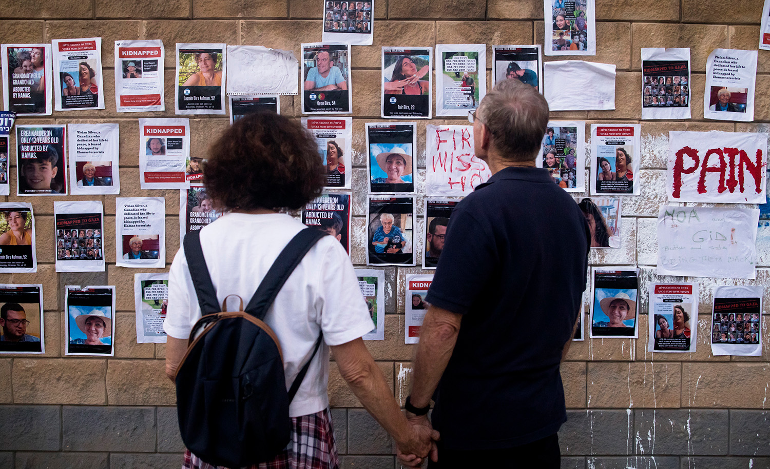 
A wall with photos of hostages kidnapped and taken to Gaza on October 17, 2023 in Tel Aviv, Israel. Amir Levy/Getty Images.






