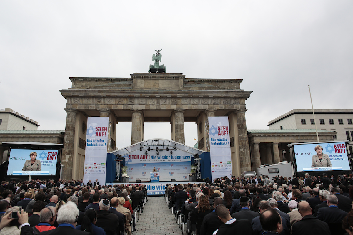German Chancellor Angela Merkel delivers her speech at a rally against anti-Semitism near the Brandenburg Gate in Berlin, Sept. 14, 2014. Photo by Markus Schreiber/AP.
