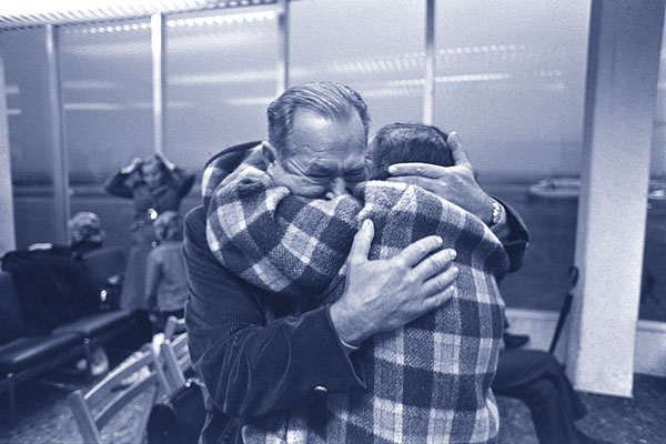 A Jewish woman, just arrived from Russia, sees her brother for the first time in twenty years at Lod Airport, November 15, 1972. Moshe Milner/Government Press Office (Israel).